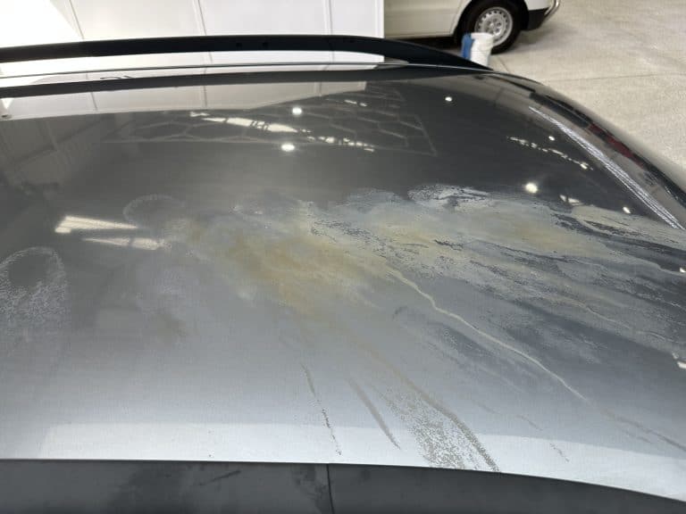 Heavy mineral stains on car roof from underground car park